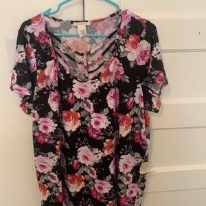 Black top with pink red flowers all around